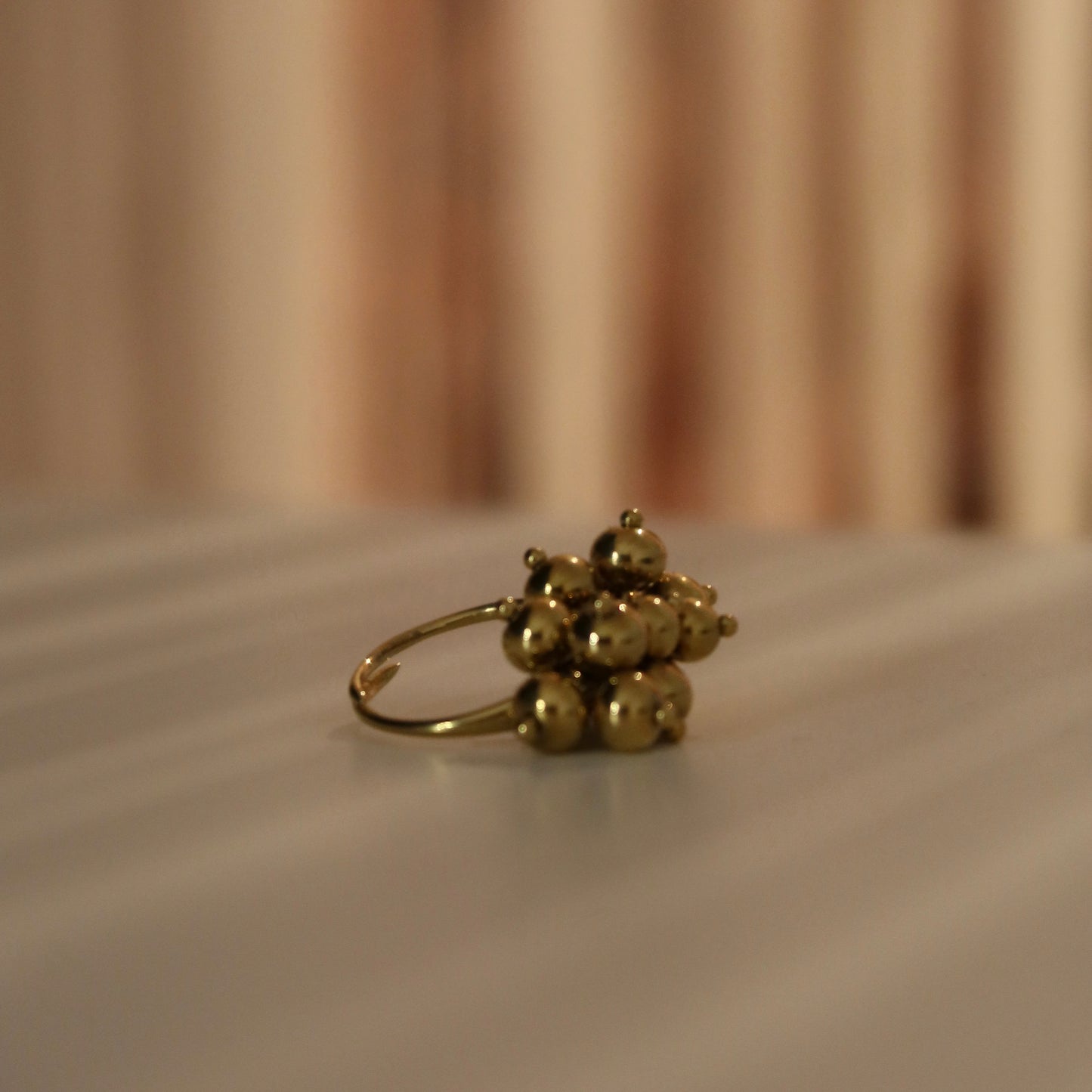 Anello grappolo acciaio dorato