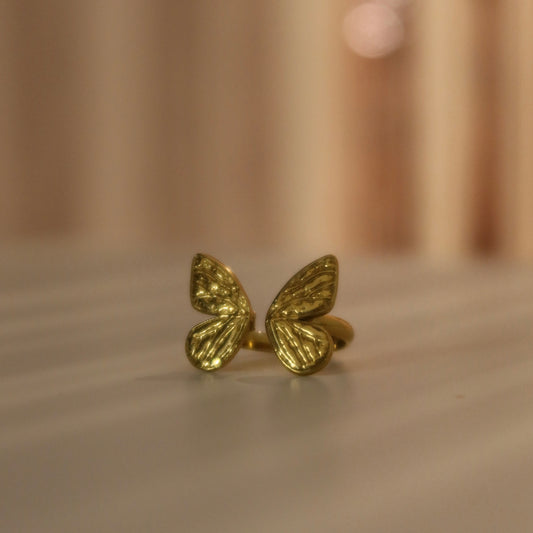 Anello farfalla acciaio dorato