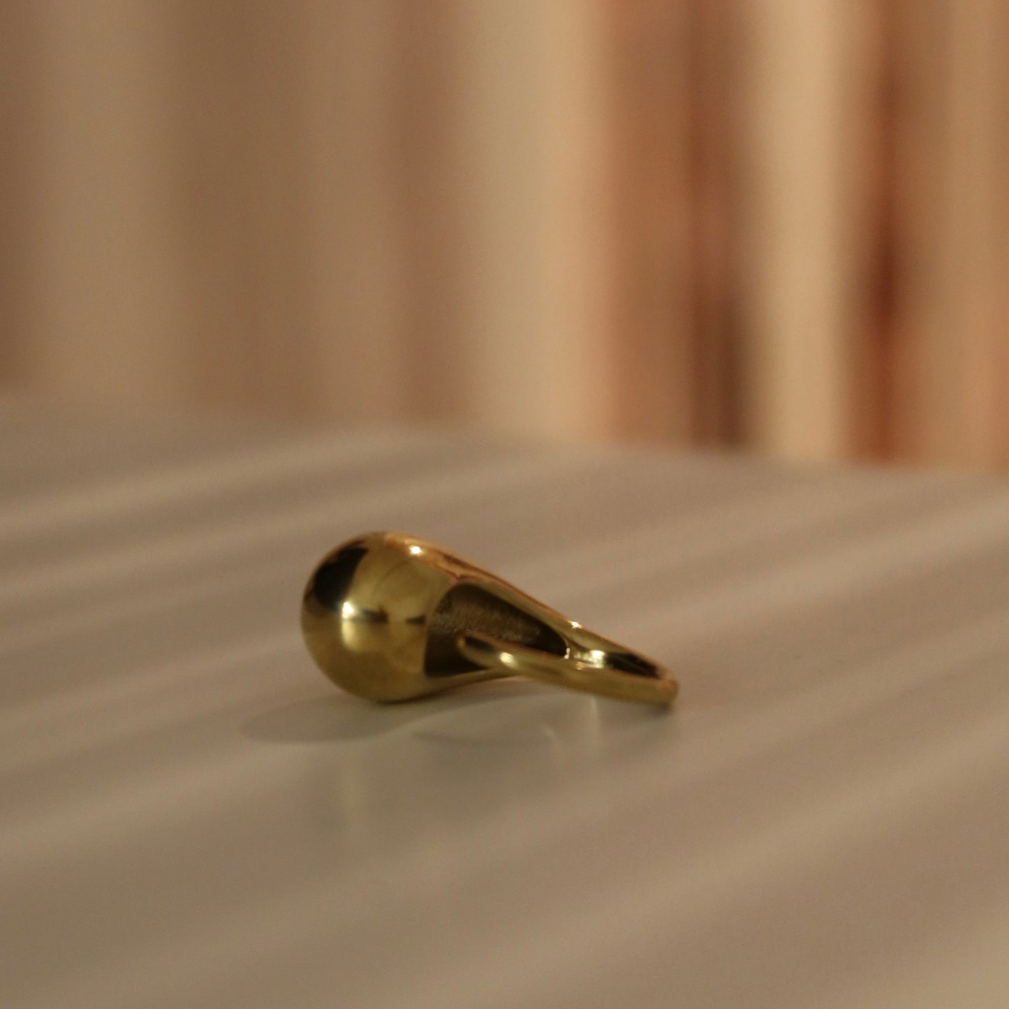 Anello goccia  acciaio dorato