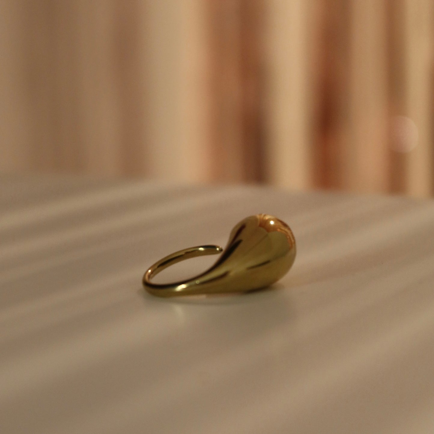 Anello goccia  acciaio dorato